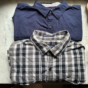 Two men’s large button down shirts
